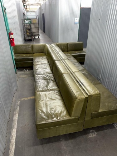 modular sectional sofa upholstered in olive-green leather/vinyl