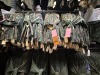 Collection of approx. (120) USMC BDU's, collar, buttons, various sizes