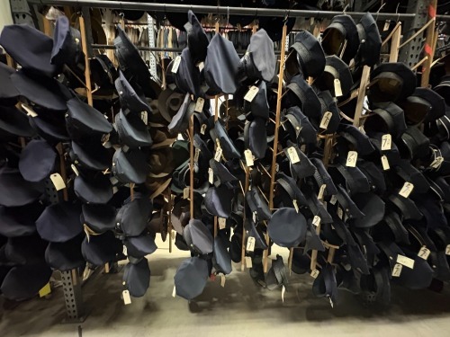 Collection of (40+) SFPD Hats with Rack