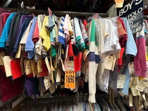 Collection of assorted era boy's polo shirts.