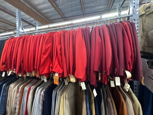 Collection of red suits, various eras
