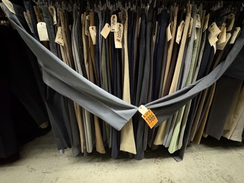 Collection of assorted 1980's non-pleated dress pants. Assorted sizes.