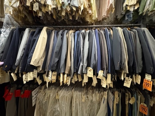 Collection of (100) assorted 1980's 2pc suits. Assorted sizes