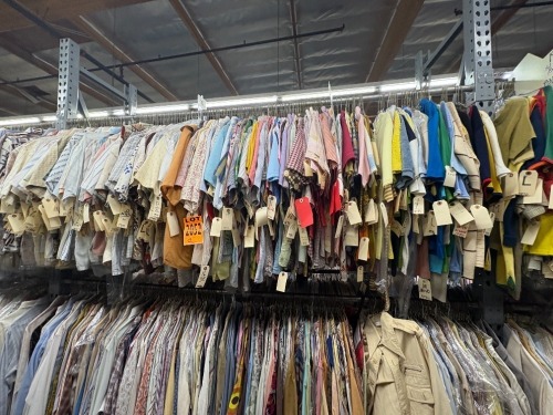 Collection of assorted 1970's polyester print short sleeve shirts. Assorted sizes.