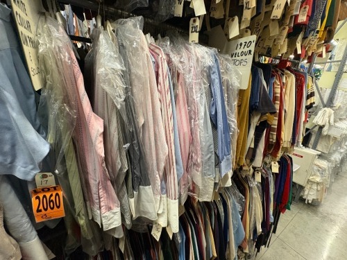 Collection of assorted 1970's collared solid and print shirts. Assorted sizes