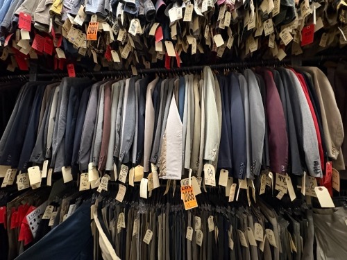 Collection of (50) assorted 1990's 2pc suits. Assorted sizes