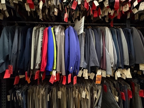 Collection of (50) assorted 1990's 2pc suits. Assorted sizes