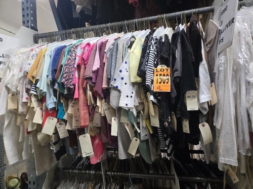 Collection of 1990's era shirts, pullovers, tops