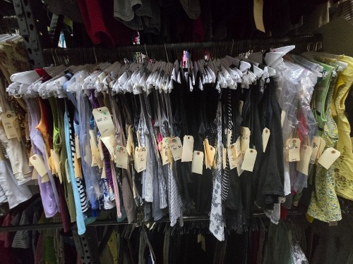 Collection of 2000's era trendy club tops, dresses