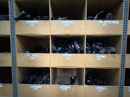 Collection of assorted footwear in 9 cubbies, incl. Captoe Combat Boots, Navy Oxfords, various sizes