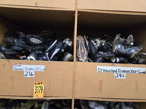 Collection of assorted sports shoes, football cleats, in 2 cubbies