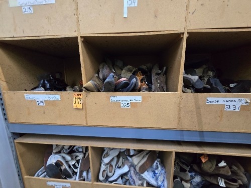Collection of assorted sports shoes, football cleats, in 2 cubbies