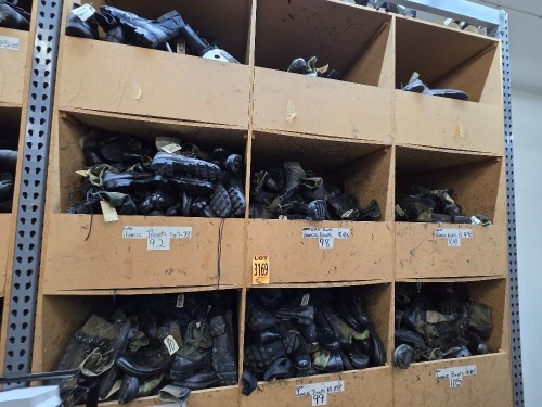 Collection of assorted Military-style footwear in 9 cubbies, incl. Jungle Boots